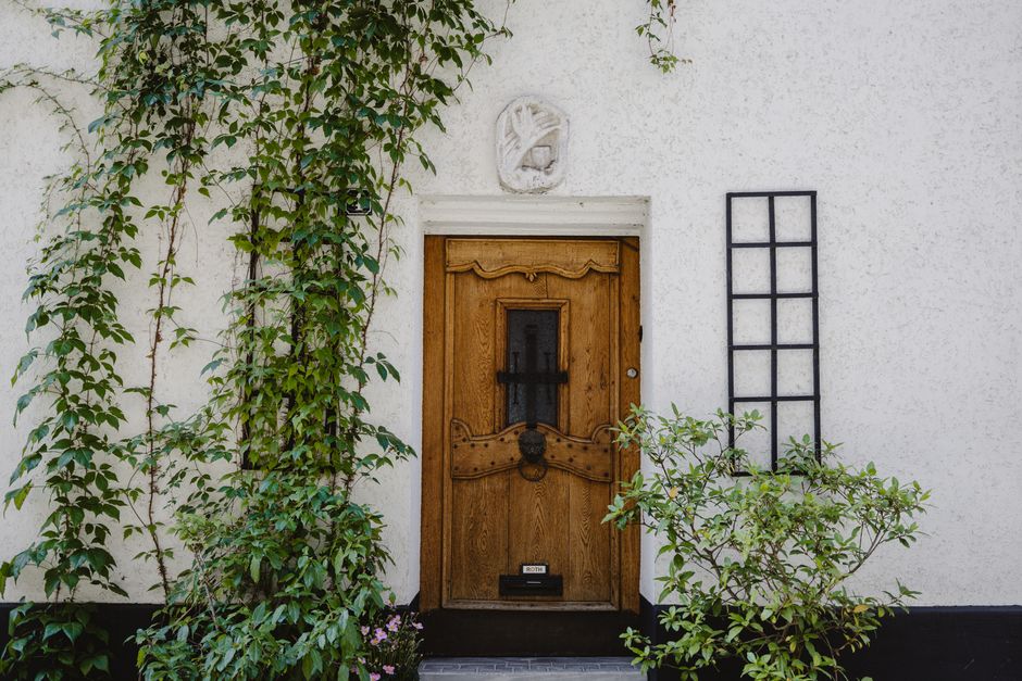 A house exterior with painted walls and trim.